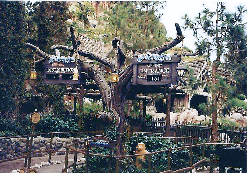Themed commercial entrance with sculpted concrete trees